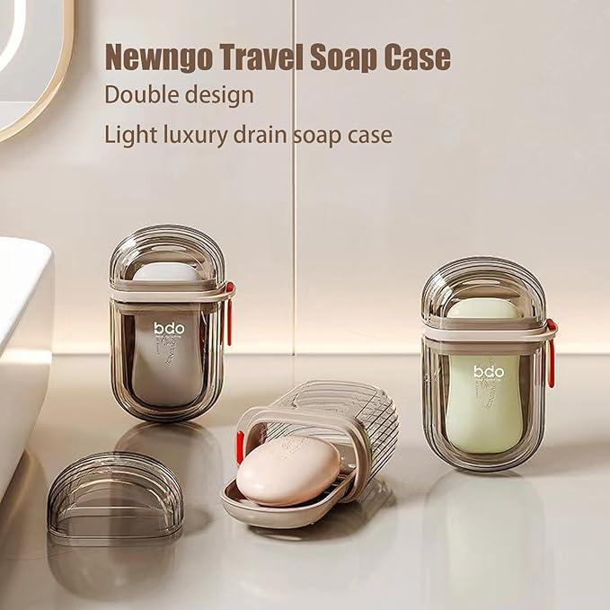 Newngo travel soap case double design with drain feature, displayed on bathroom counter