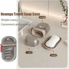 Newngo travel soap case with lid, box body, drainer, and white soap on bathroom counter