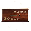 Wooden money bank with coin slot and engraved letters on top