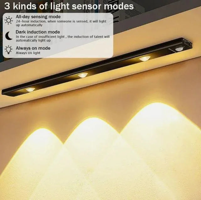 LED under cabinet light bar showing three light sensor modes, warm lighting on wall